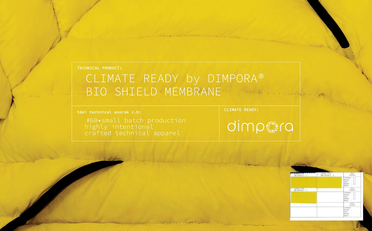 Close-up of the technical anorak in field yellow, with a plate reading: Climate ready by DIMPORA® bio shield membrane. tèmi technical anorak 2.0: #60, small batch production, highly intentional, crafted technical apparel.